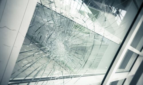 A window in a rental property is broken due to tenant negligence