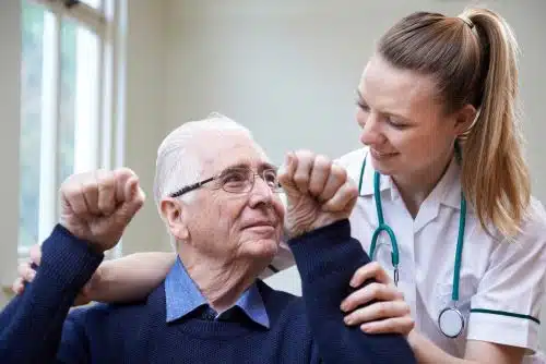 A doctor gives a stroke test to a patient.