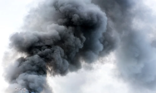 A large plume of dark smoke after the BioLab chemical plant fire in Conyers.