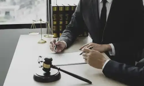 A wrongful death lawyer assisting a client with pursuing a claim.