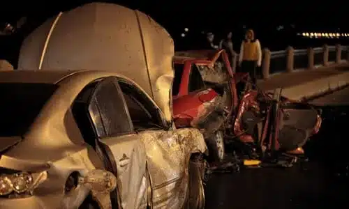Two vehicles on a flyover having collided after one attempted to change lane at the wrong time.