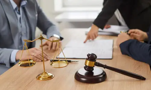 An accident victim consulting with defective product lawyers for legal advice.