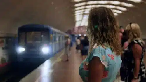 people waiting in the subway or a train
