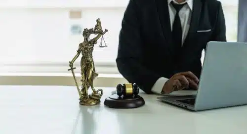 A medical malpractice lawyer works at his desk in his Fulton County law office.