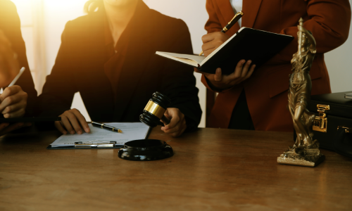 Wrongful death lawyers providing assistance to a client to build a case.
