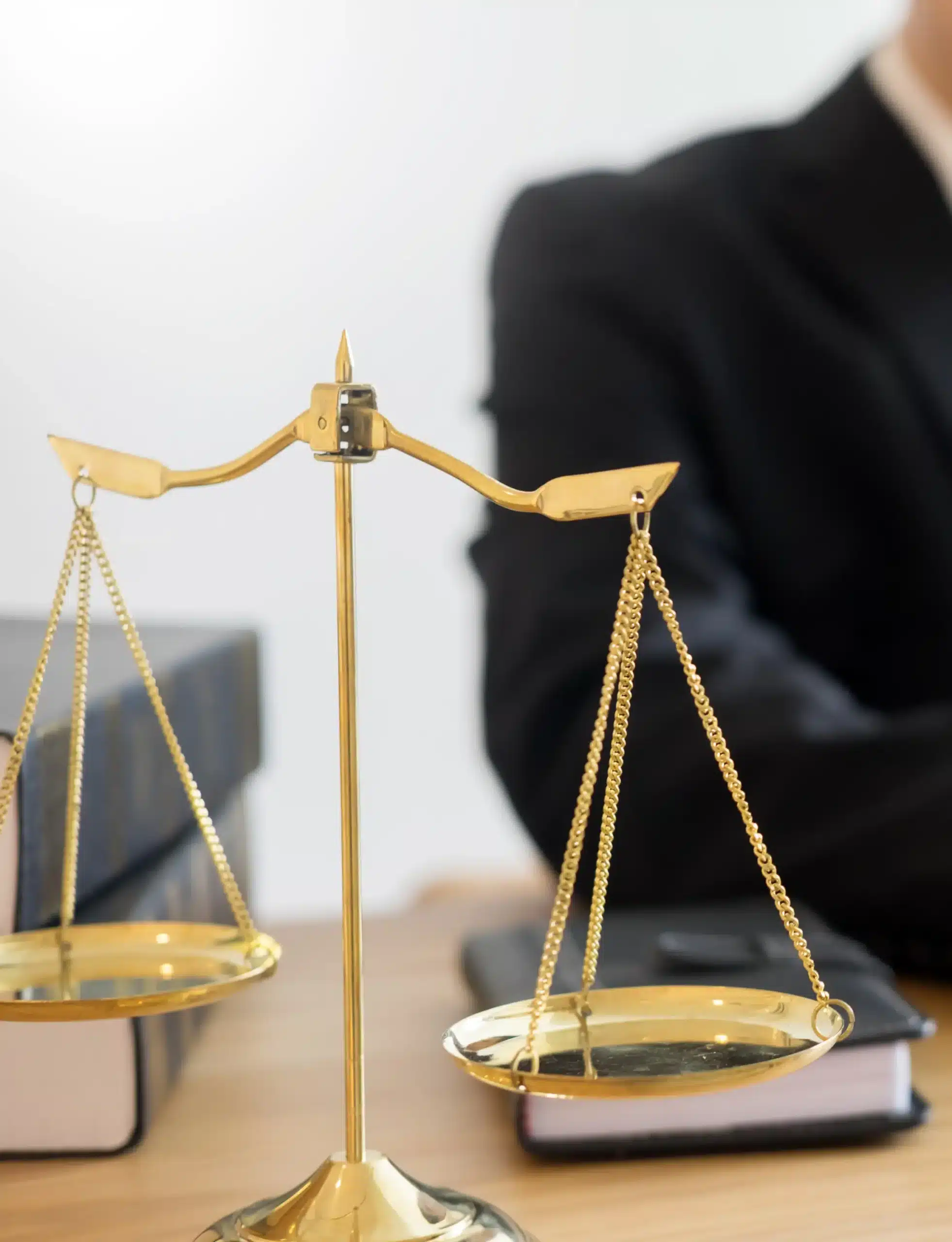 Dallas law firm office workspace with attorney desk and scales of justice