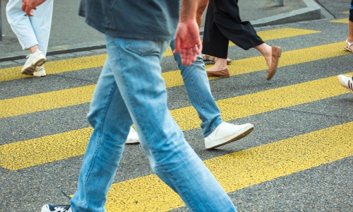 pedestrians crossing a crosswalk in Arizona